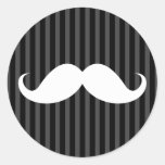 White handlebar mustache on black background oval sticker | Zazzle