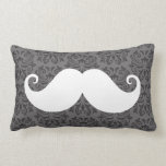 White handlebar mustache on gray damask pattern pillows