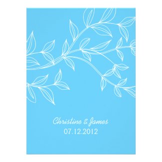 White leaves on blue wedding invitation