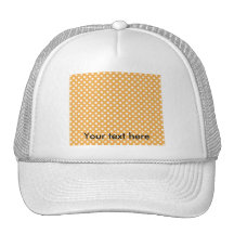 White polkadots on orange trucker hat