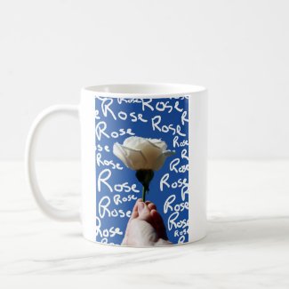 White rose, blue back, Rose written in white mug