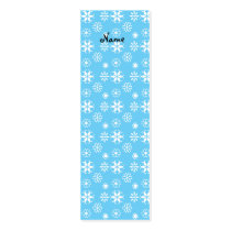 White snowflakes on blue business cards