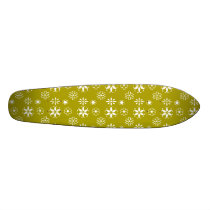 White snowflakes on gold skate boards