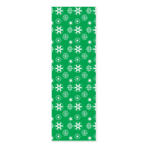 White snowflakes on green business card