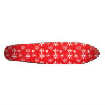 White snowflakes on red skateboards