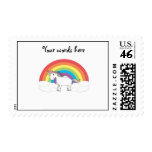 White unicorn on rainbow and clouds stamp