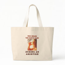 WHO HOLDS THE BABY'S HAND BAGS