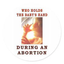 WHO HOLDS THE BABY'S HAND ROUND STICKER