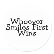 Whoever Smiles First Wins Round Sticker