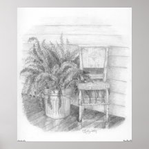 Wicker chair and fern posters