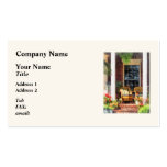Wicker Chair With Striped Pillow Business Cards
