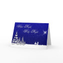 This greeting card titled Winter Christmas Silent Night card has a blue background with white snowy trees and writing that says Silent Night, Holy Night.