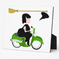 Witch Riding A Green Moped Plaque