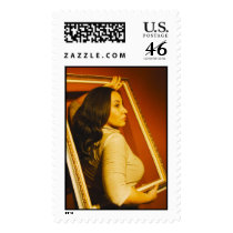 Woman in picture frame postage