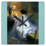 Woman reading letter wall clocks