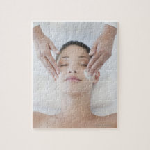 Woman receiving facial massage jigsaw puzzle