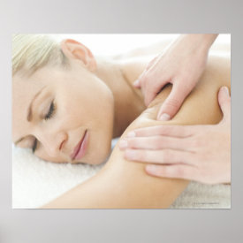 Woman relaxing at a spa while receiving a 2 posters