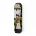 Woman With Striped Jacket and Flowered Skirt Skate Board Decks