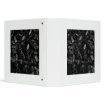 Wood pieces in black and white. 3 ring binders