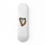 Wooden harp with engraved design skate board