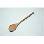 Wooden spoon for kitchen work photo sculpture