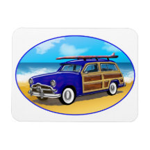 Woodie azul en la playa de oro imán