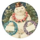 round_sticker - Vintage holiday postcard image of a snowman decorated with Christmas wreaths round_sticker - Vintage holiday postcard image of a snowman decorated with Christmas wreaths