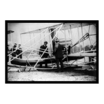 Wright Examines Canoe Attachment to Airplane 1909 posters