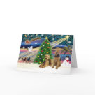 postcard - Christmas Magic with two Airedales shows the star of Bethlehem guiding three wise men while Santa and his reindeer fly into the night and a dove of peace hovers in the star light.  A Christmas tree and snowman add to the symbols of the holiday season.