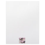 Yak outline in black against a pastel spotty back letterhead design