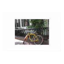 Yale: bike parked in front of Morry's posters