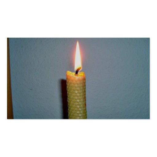 Yellow Candle flame against white wall Business Cards (back side)