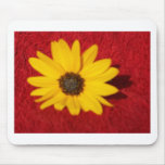 Yellow flower on red background mouse pads