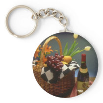 Yellow Picnic basket with wine, cheese, bread and Keychains