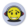 Yellow smiley face wearing headphones refrigerator magnet