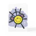 Yellow smiley snowflake with ear muffs cards