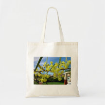 Yellow Wattle blossom against blue sky Bag