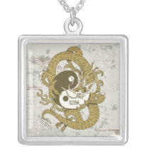 Yin yang Chinese symbol and dragon necklaces