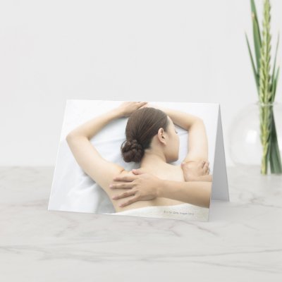 young woman receiving massage,woman in health 2 greeting cards