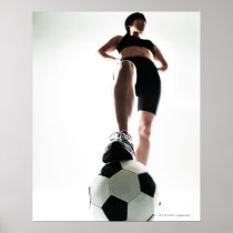 young woman training,football print