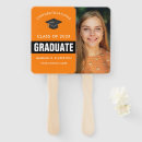Search for orange and black graduation favors Graduate