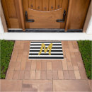 Search for black and gold doormats Letter