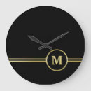 Search for black and gold clocks Logo
