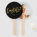 Search for black and gold graduation favors Script