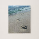 Search for footprints in the sand puzzles Ocean