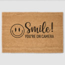 Search for camera doormats You're on camera