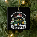 Search for tractor ornaments Santa