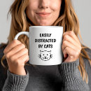 Search for kitty mugs typography
