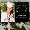 Search for black and gold graduation favors Script