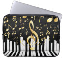 Search for music laptop sleeves gold